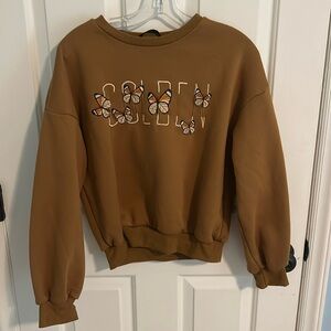 Embroidered golden sweatshirt